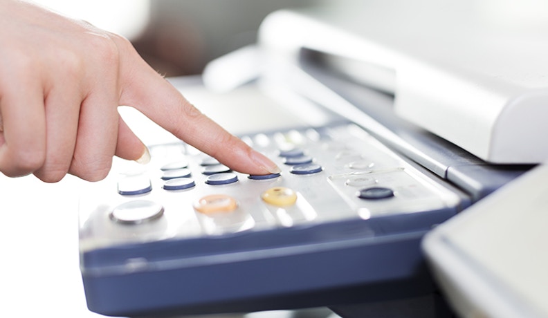 7 key benefits of a managed print services mps program 830 person using cash register